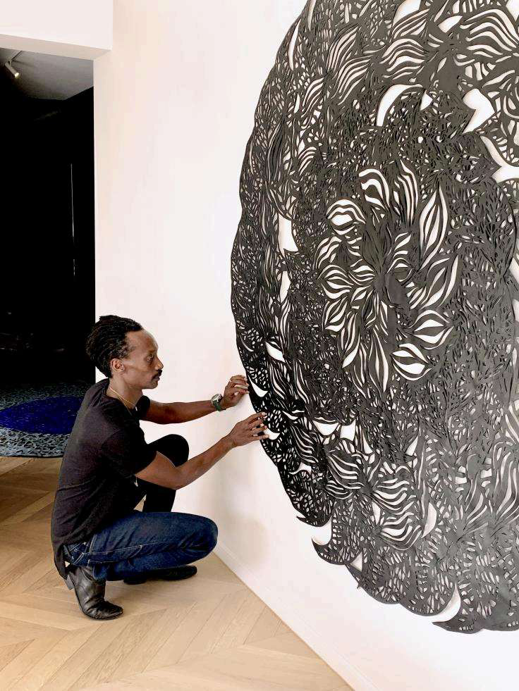 Circular piece being hung — Munana Gatera