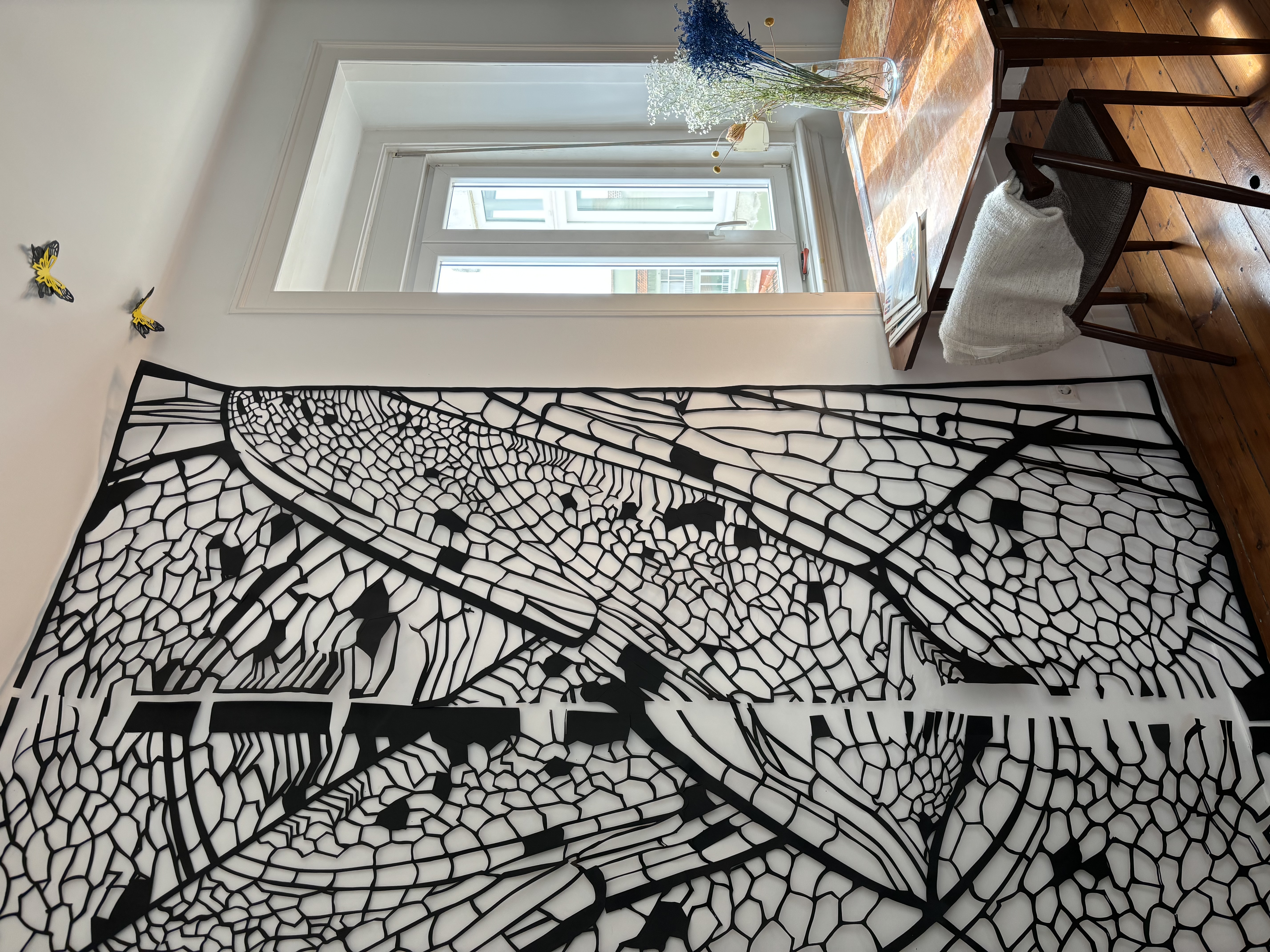 DETAIL — THE PANEL AGAINST THE WALL — Munana Gatera